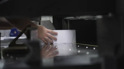 Machine is cutting format in printing house. 4K Stock Footage 64127760