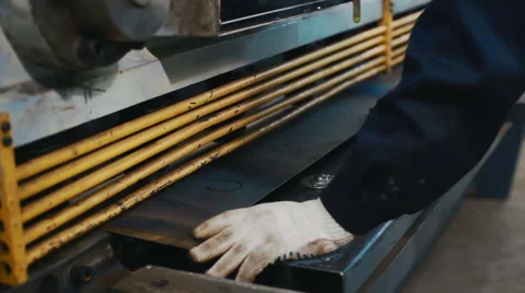 Machine cutting iron sheet Stock Footage 58065287