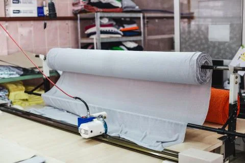 Machine for cutting a large fabrics Stock-Fotos