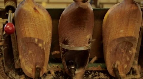 Machine is cutting out the inside of clogs Stock Footage 46999459