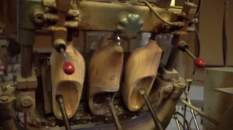 Machine is cutting out the inside of clogs [Slomo] Video stock 47077213