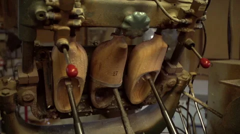 Machine is cutting out the inside of clogs [Slomo] Video stock 47078109