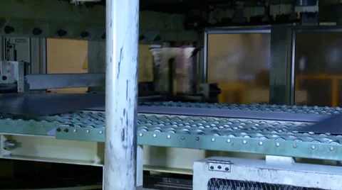 Machine is cutting sheet metal in automobile factory Stock Footage 35341489