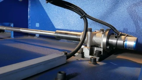 Machine for cutting sheet metal. Large hydraulic guillotine shears. Rear view: a Stock Footage 71656987