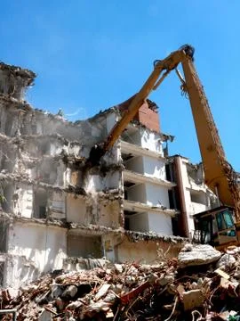 Machine demolition of the building,blur Stock Photos