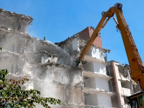 Machine demolition of the building,blur Stock Photos