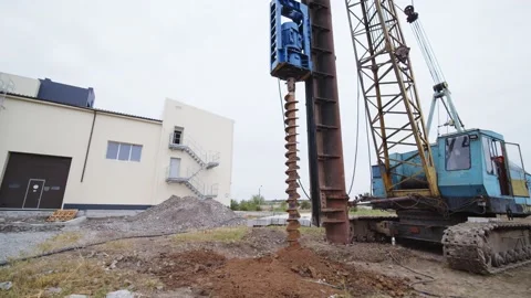 Machine Drilling Foundations Stock Footage 197115425