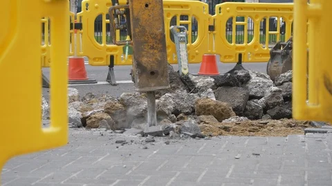 A machine drilling the road. 스톡 동영상 107354622