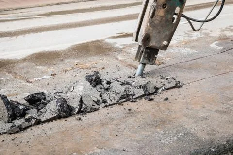 Machine drilling road Stock Photos