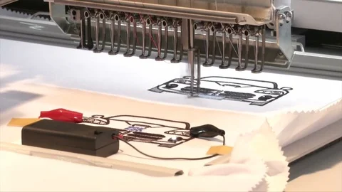 Machine embroidering car on fabric Stock Footage 81450674