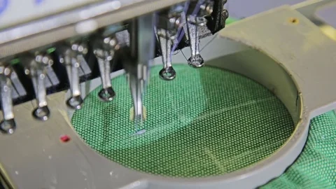 Machine embroidering a pattern on a textile Stock Footage 69855844
