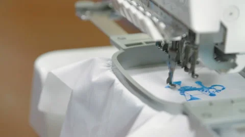 Machine embroidering on the shirt Stock Footage 62352213