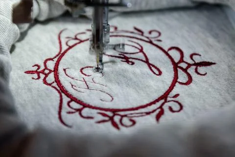 Machine embroidery on initials. Perfect gift Stock Photos