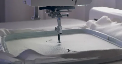 Machine embroidery work.Working embroidery machine. Textile - Professional and Stock Footage 77626271