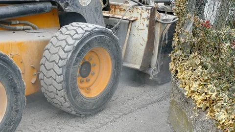 Machine excavator with rotary grinder working on asphalt road Stock Footage 108359238