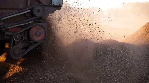 The machine on the field makes fertilizer. The machine sprinkles fertilizer. Stock Footage 128546491