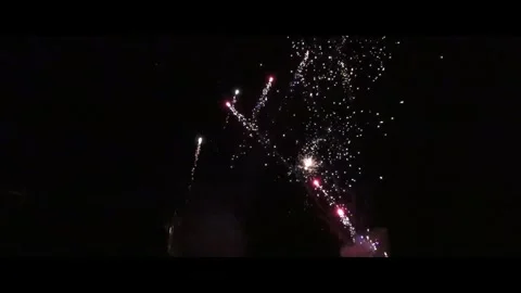 Machine gun fire works shooting at night sky, close up Stock Footage 294010270