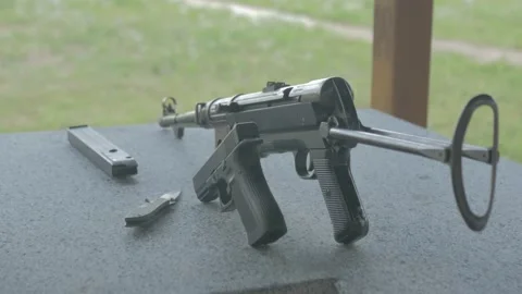 Machine gun, pistol and knife in position at the shooting range Stock Footage 195095450