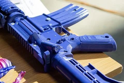 Machine gun printed on a 3D printer. Model prototype of the machine gun created Stock Photos