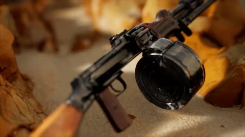 Machine gun at the sand Stock Footage 129882489