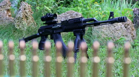 Machine gun set on ground Stock Footage 56525394