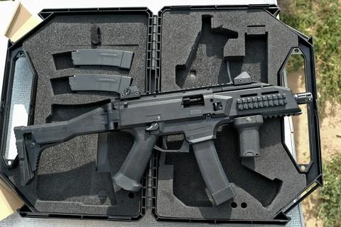 Machine gun is on the table. machine gun close-up. military weapon. Фото