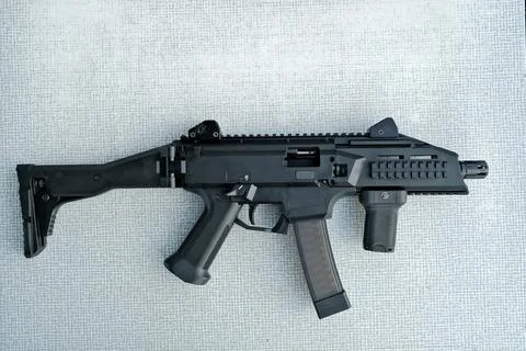 Machine gun is on the table. machine gun close-up. military weapon. Stock Photos