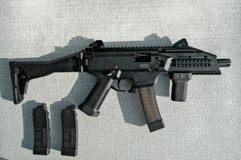 Machine gun is on the table. machine gun close-up. military weapon. Stock Photos