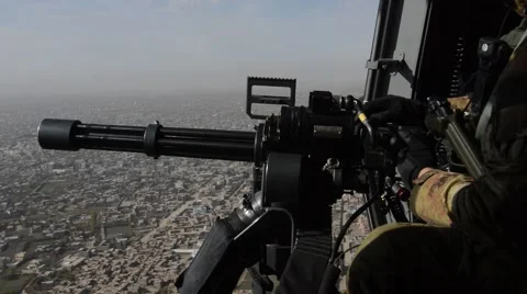 Machine gunner during a tactical flight over Herat 스톡 동영상 44666078