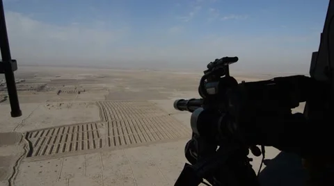 Machine gunner during a tactical flight over Herat 스톡 동영상 44667308