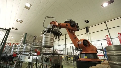 Machine handling beer kegs Stock Footage 77100890