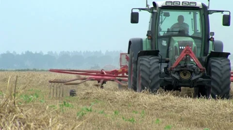 Machine is harvesting hay Stock Footage 8556184