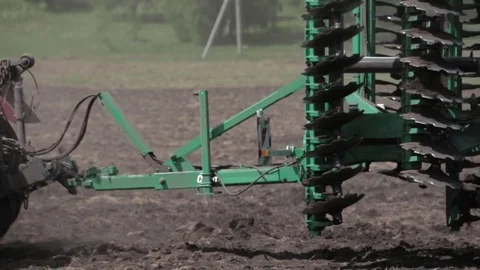 Machine harvesting soybeans in a farm Stock-Footage 78672364