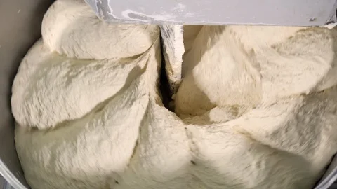 Machine knead the dough from flour production plant bread plant bread fresh Stock Footage 105754259