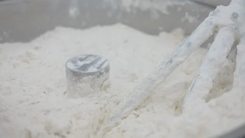 Machine kneading bread dough. Raw dough in a industrial bakery dough mixer 스톡 동영상 143961870