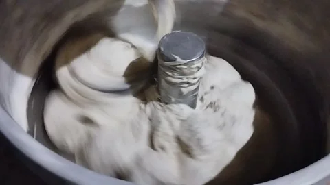 The machine kneads bread at high speed Video stock 241351386