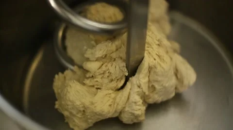 Machine kneads dough Stock Footage 64702698