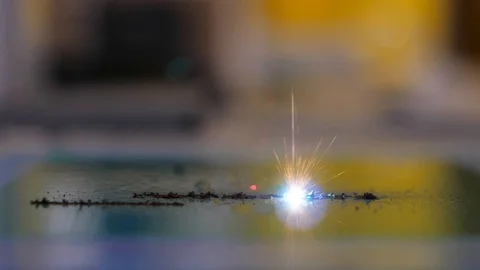 Machine for laser engraving. The laser burns out letters on plastic. Stock Footage 130066266