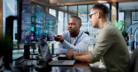 Machine Learning Engineer And Data Scientist Collaborate On AI Model Developm Stock Photos