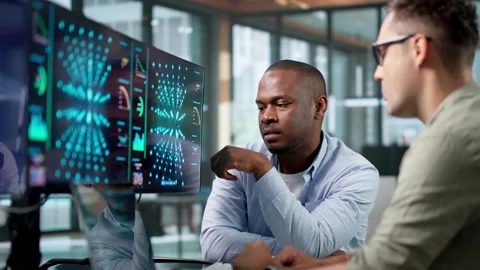 Machine Learning Engineer Collaborates With Data Scientist 動画素材 345851766