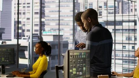 Machine learning infrastructure technicians using tablet to do checkup Foto stock