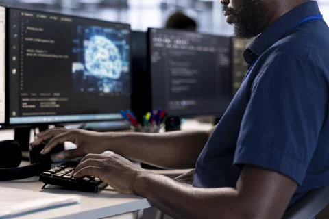 Machine learning specialist ensuring data center operates efficiently Stock Photos