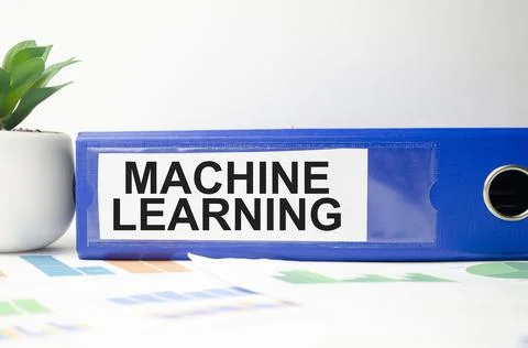 Machine learning text written on folder with documents Fotos de archivo