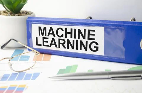 Machine learning text written on folder with documents Fotos de archivo