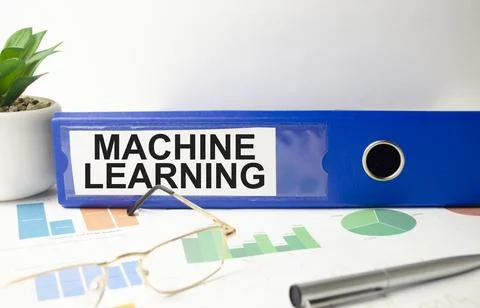 Machine learning text written on folder with documents Stock Photos