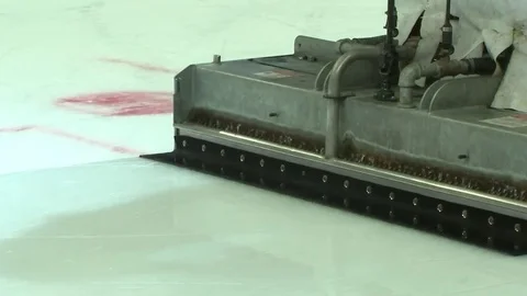 Machine for leveling the ice machine fills the ice Stock Footage 83259051