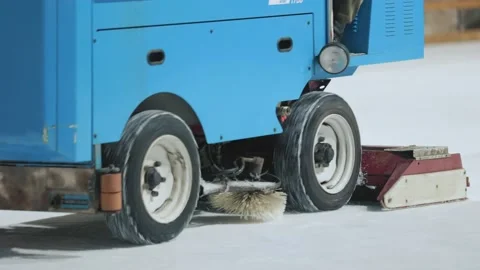 Machine levels the ice on the rink Stock Footage 169528970