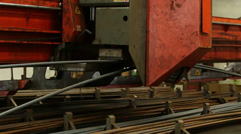 Machine Lifting Steel Bars with Magnet Stock Footage 33851233