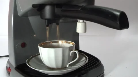 Machine made coffee and poured it into a cup Stock Footage 977862