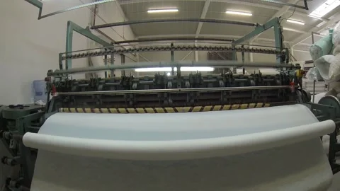 Machine that makes the seam of the basic material that ensures the covering Stock-Footage 145937155